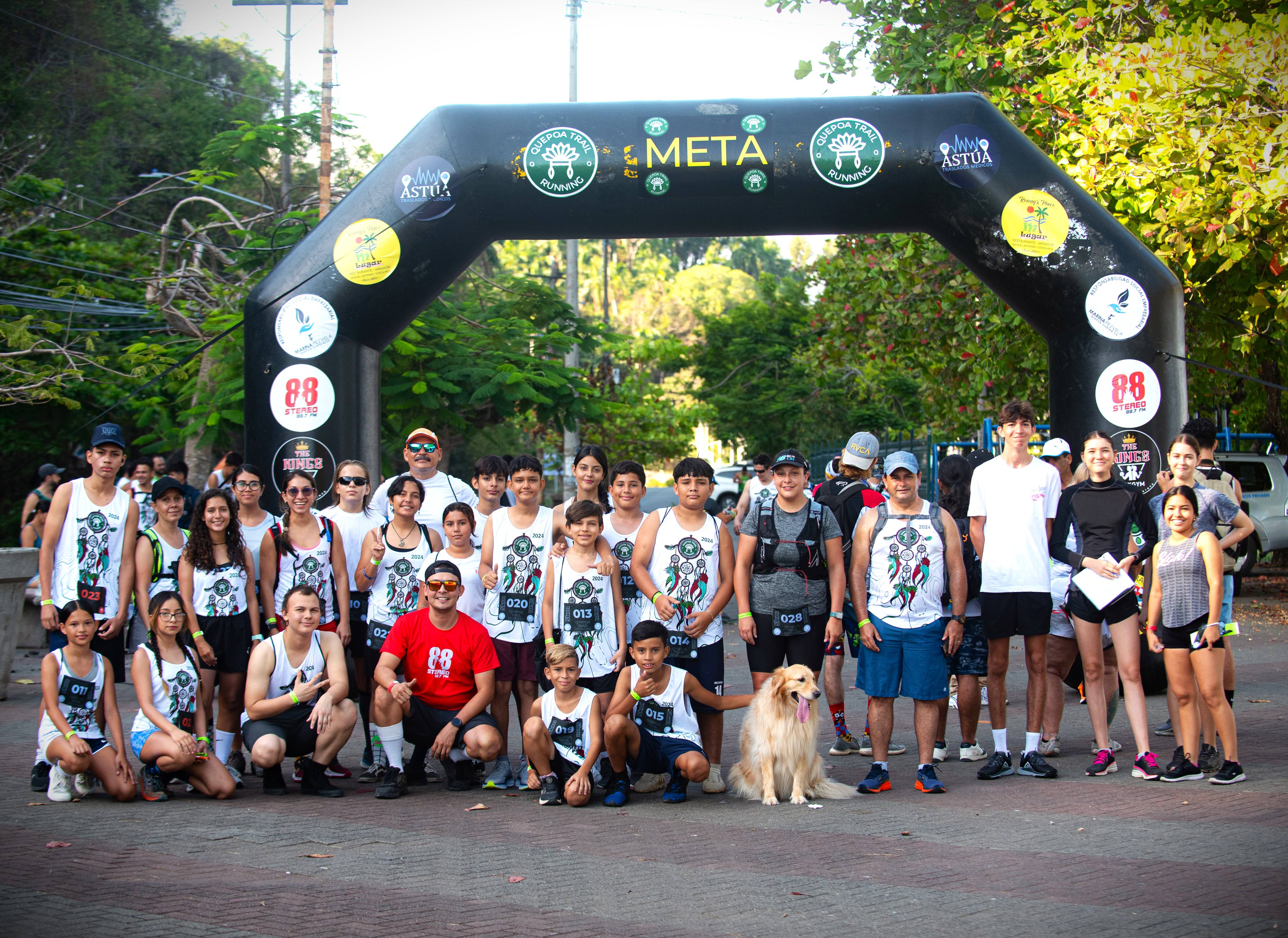 Local students and community members at Quepoa Trail Running finish line